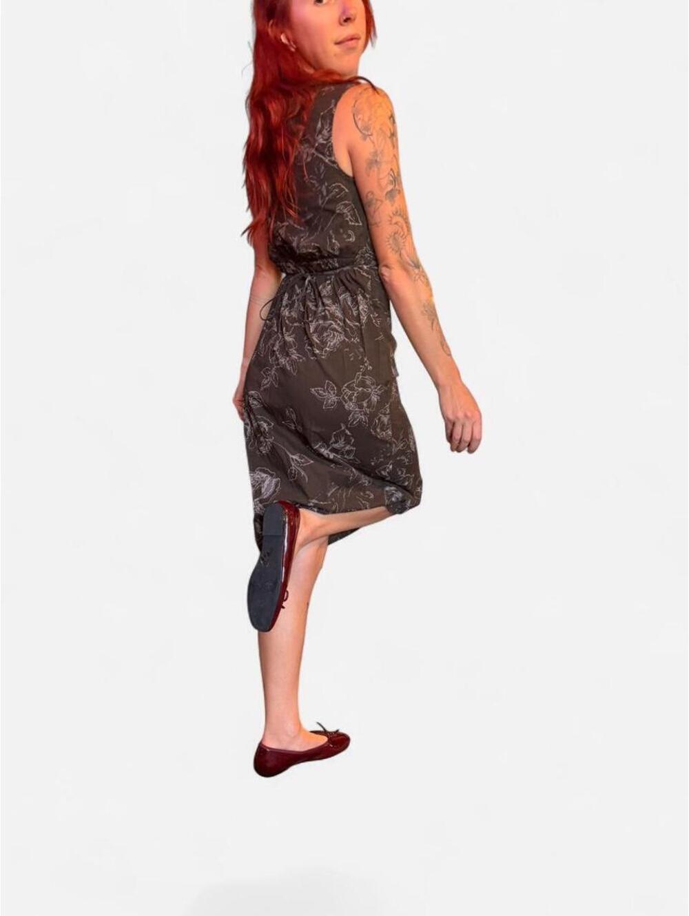 Y2Kutie dress. Beautiful chocolate brown with floral design and tie back.